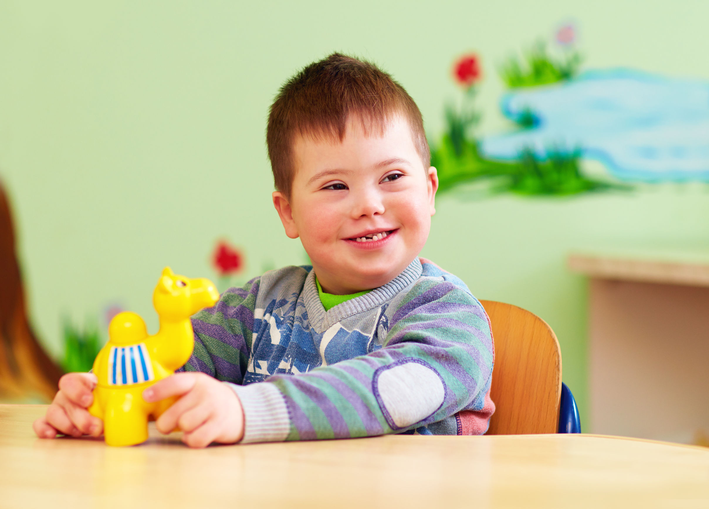Child with Down Syndrome in kindergarten